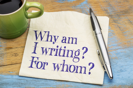 This is a photo of a piece of paper with a pen next to it. The text on the paper says, "Why am I writing? For whom?"